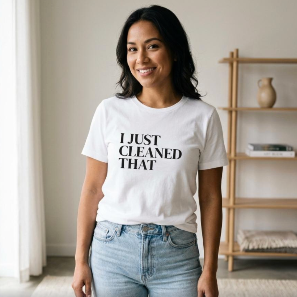 Woman wearing white “I Just Cleaned That” t-shirt indoors, relaxed fit casual mom outfit