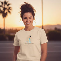 Woman wearing ivory Aquarius Mama zodiac t-shirt outdoors at sunset, celestial water bearer design centered and visible