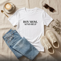 White “Boy Mom. Send Help” graphic t-shirt flat lay with jeans and sneakers, everyday mom outfit styling