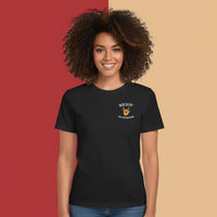 Woman wearing a Comfort Colors t-shirt in black with a logo on a red and beige background