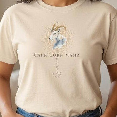 Close-up of Capricorn Mama ivory zodiac graphic on women's t-shirt showing centered chest design