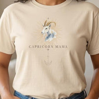 Close-up of Capricorn Mama ivory zodiac graphic on women's t-shirt showing centered chest design