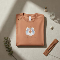 Load image into Gallery viewer, Flat lay of sandstone Gemini Mama zodiac t-shirt with printed watercolor twin design on neutral background