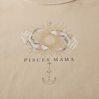 Close-up detail of Pisces Mama celestial koi zodiac graphic printed on ivory t-shirt