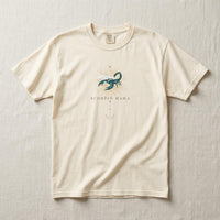 Scorpio Mama ivory zodiac mom graphic t-shirt flat lay on neutral linen background