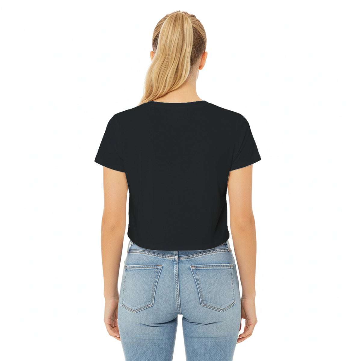 Woman wearing a black t-shirt and light blue jeans on a white background